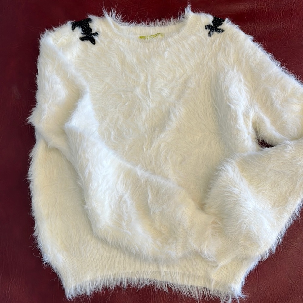 Gianni Bini cream sweater with black beaded appliqué on shoulder